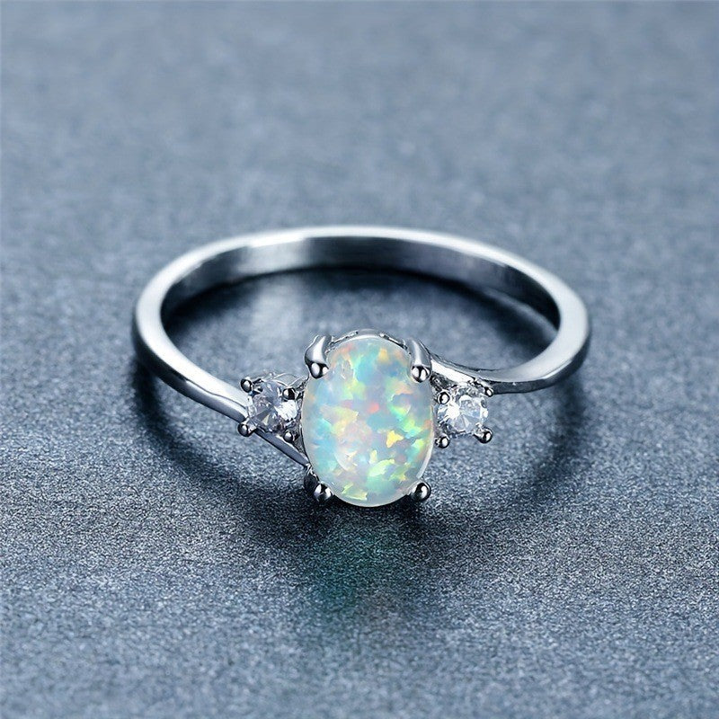 Anillo Abrazo de Ópalo | Oro Blanco