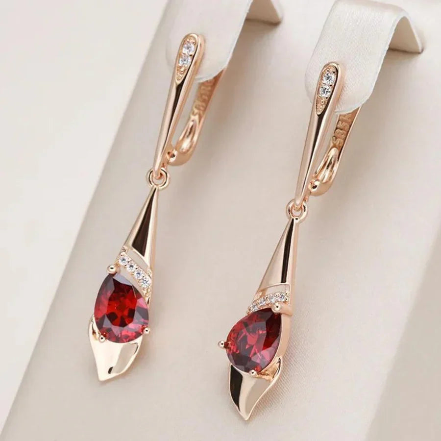 Aretes con Dije de Cristal Rojo Exquisitos | Oro