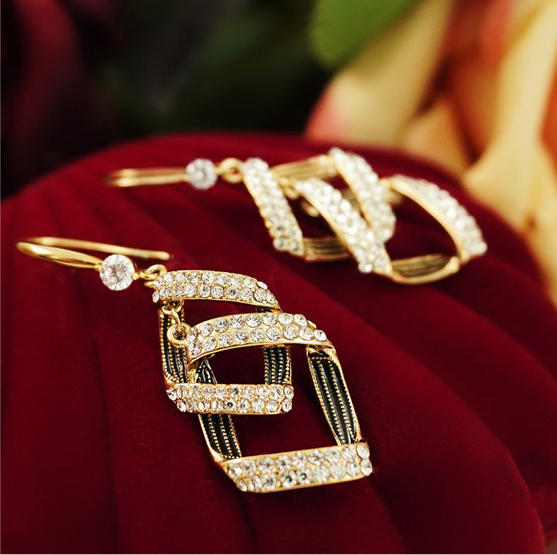 Stella Virelle Aretes en Capas | Oro