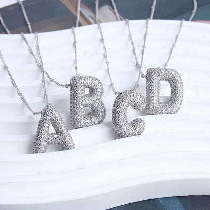 Set de Collar con Inicial Bubble | Oro Blanco