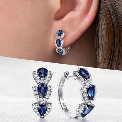 Aretes Crest de Zafiro Real | Oro Blanco