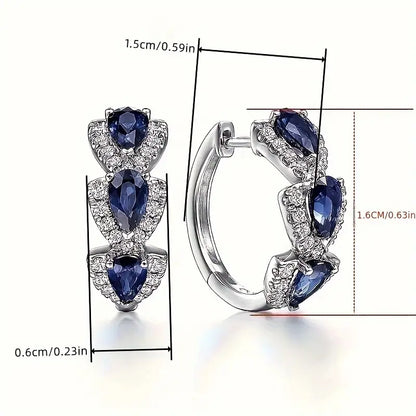 Aretes Crest de Zafiro Real | Oro Blanco
