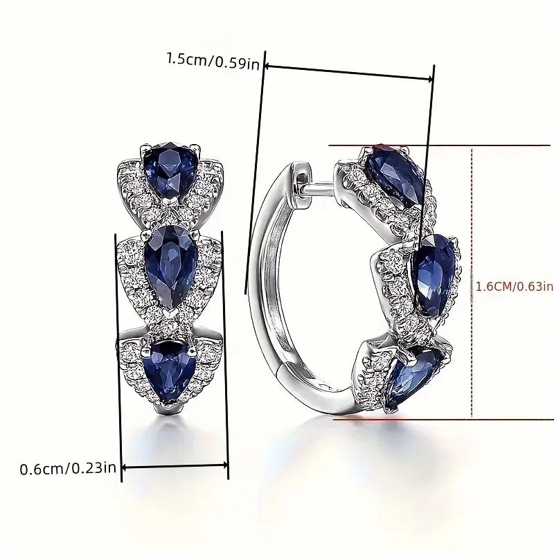 Aretes Crest de Zafiro Real | Oro Blanco