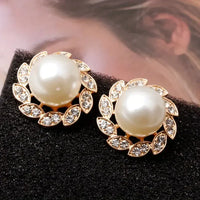 Aretes de Perla y Hojas Brillantes Exquisitos | Oro